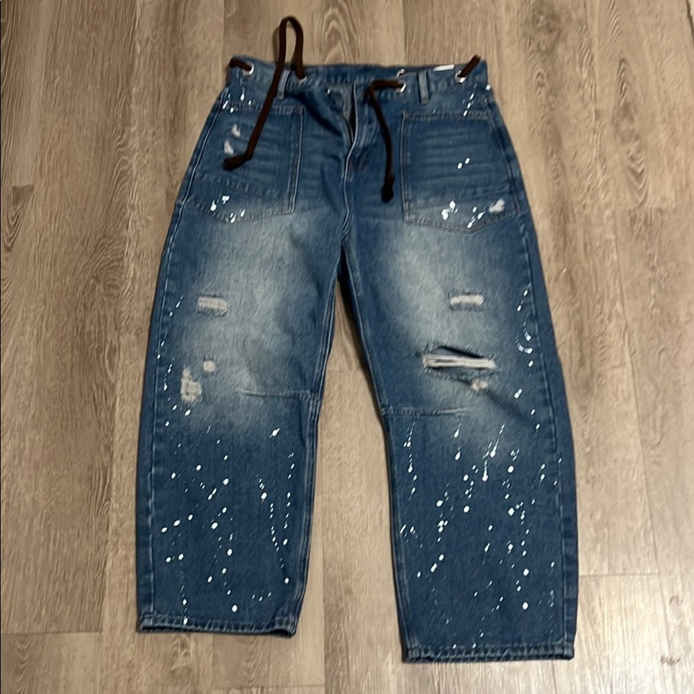 Blue Relaxed Fit Distressed Jeans with Paint Splatter